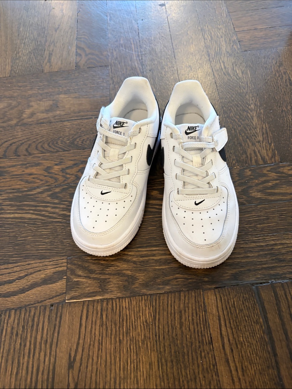 Nike Kids White Sneakers with Black Swoosh - Low Top